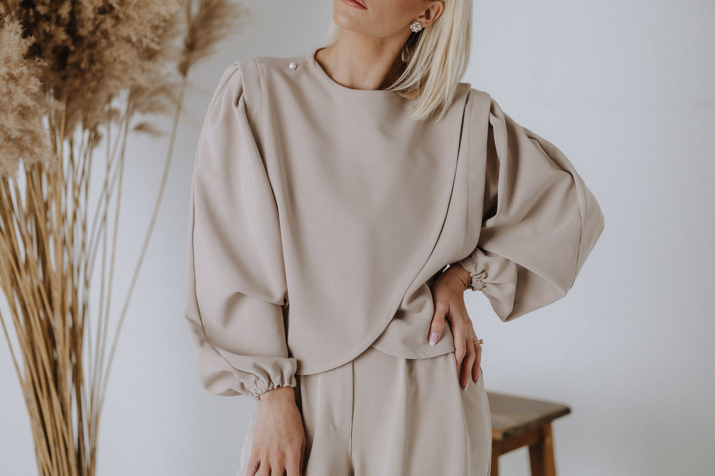 Overlapping beaded top in taupe
