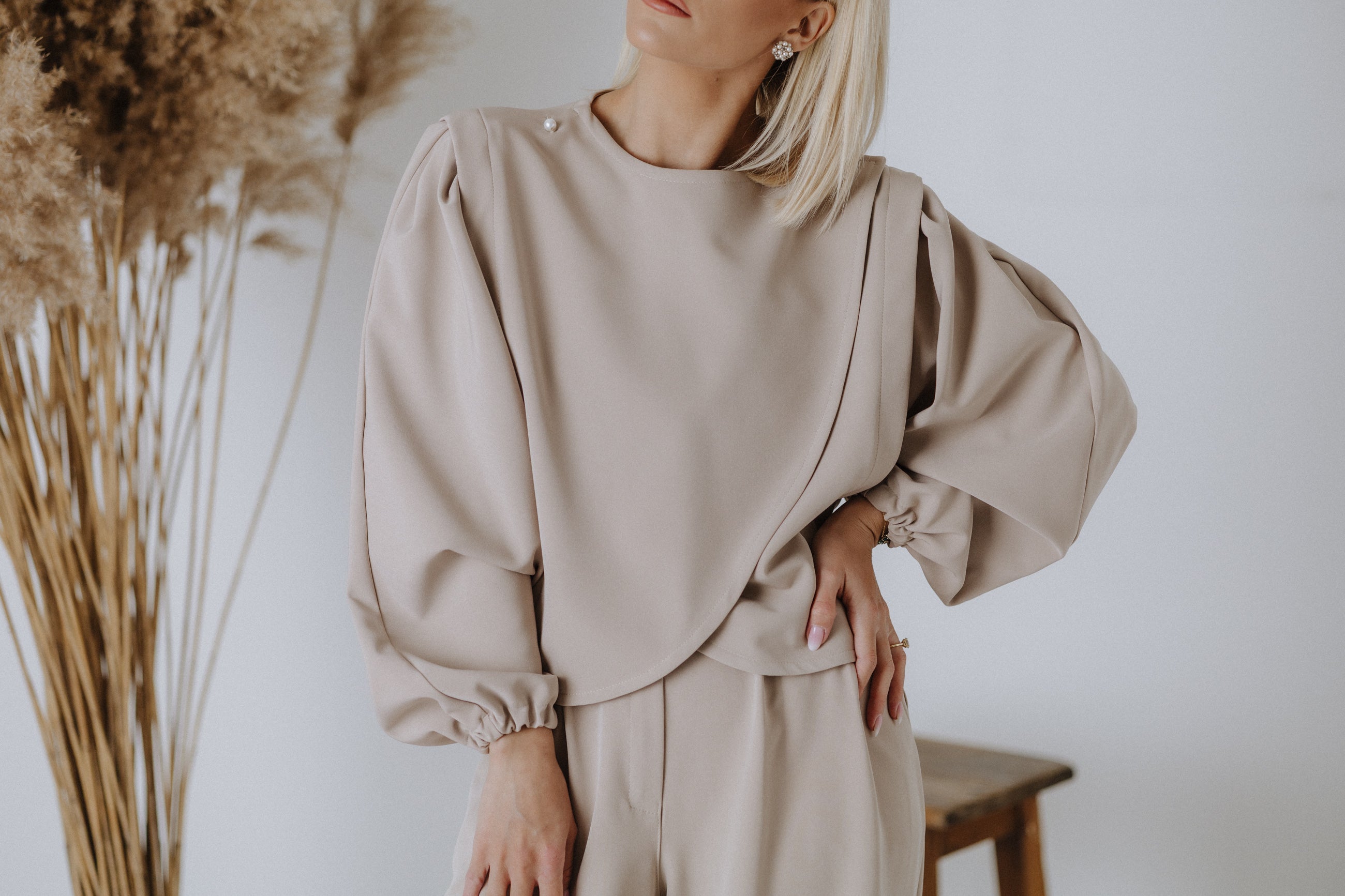 Overlapping beaded top in taupe