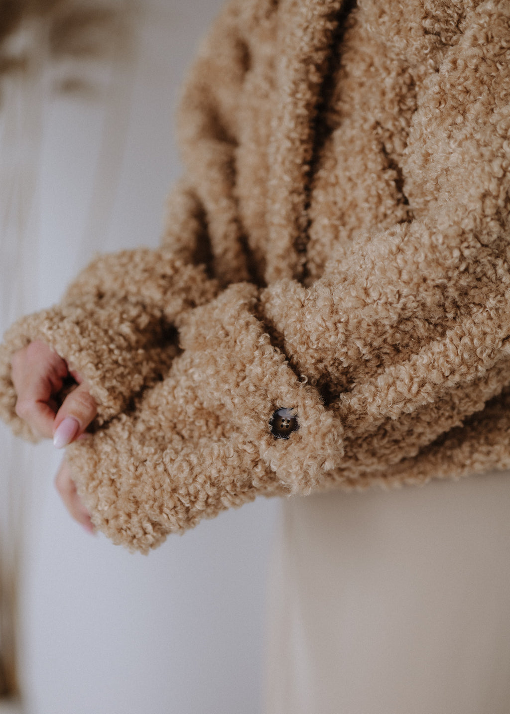 Short teddy coat in beige