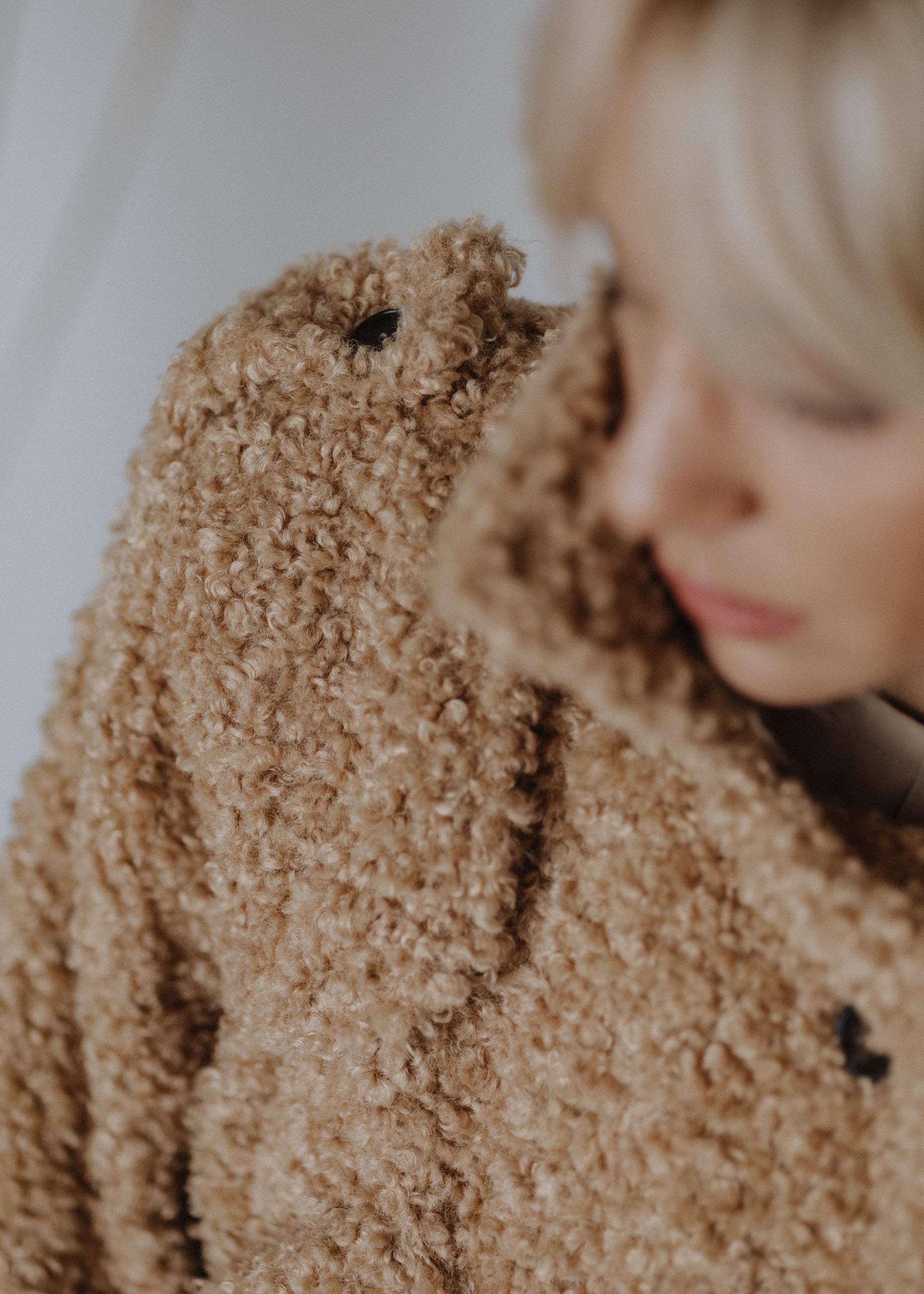 Short teddy coat in beige