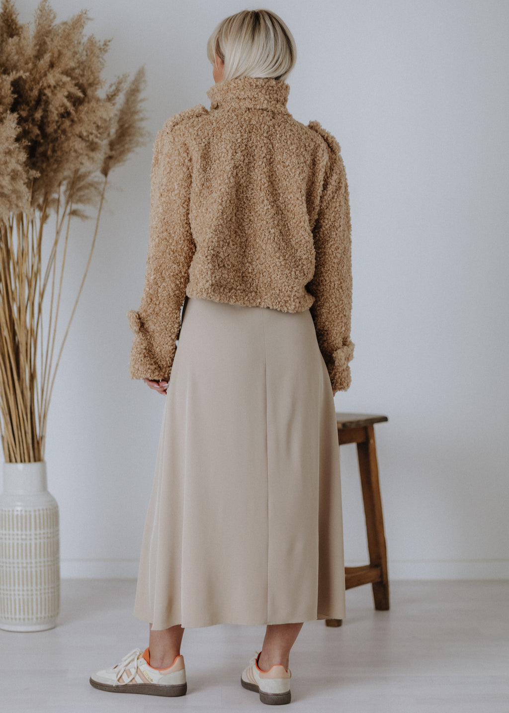 Short teddy coat in beige