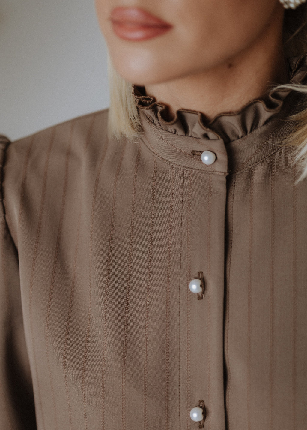 Striped blouse in mocha color