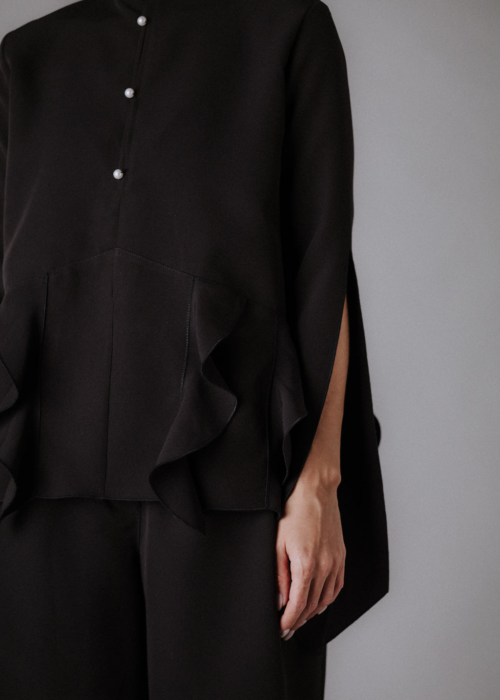 Fine fabric with top curls in black