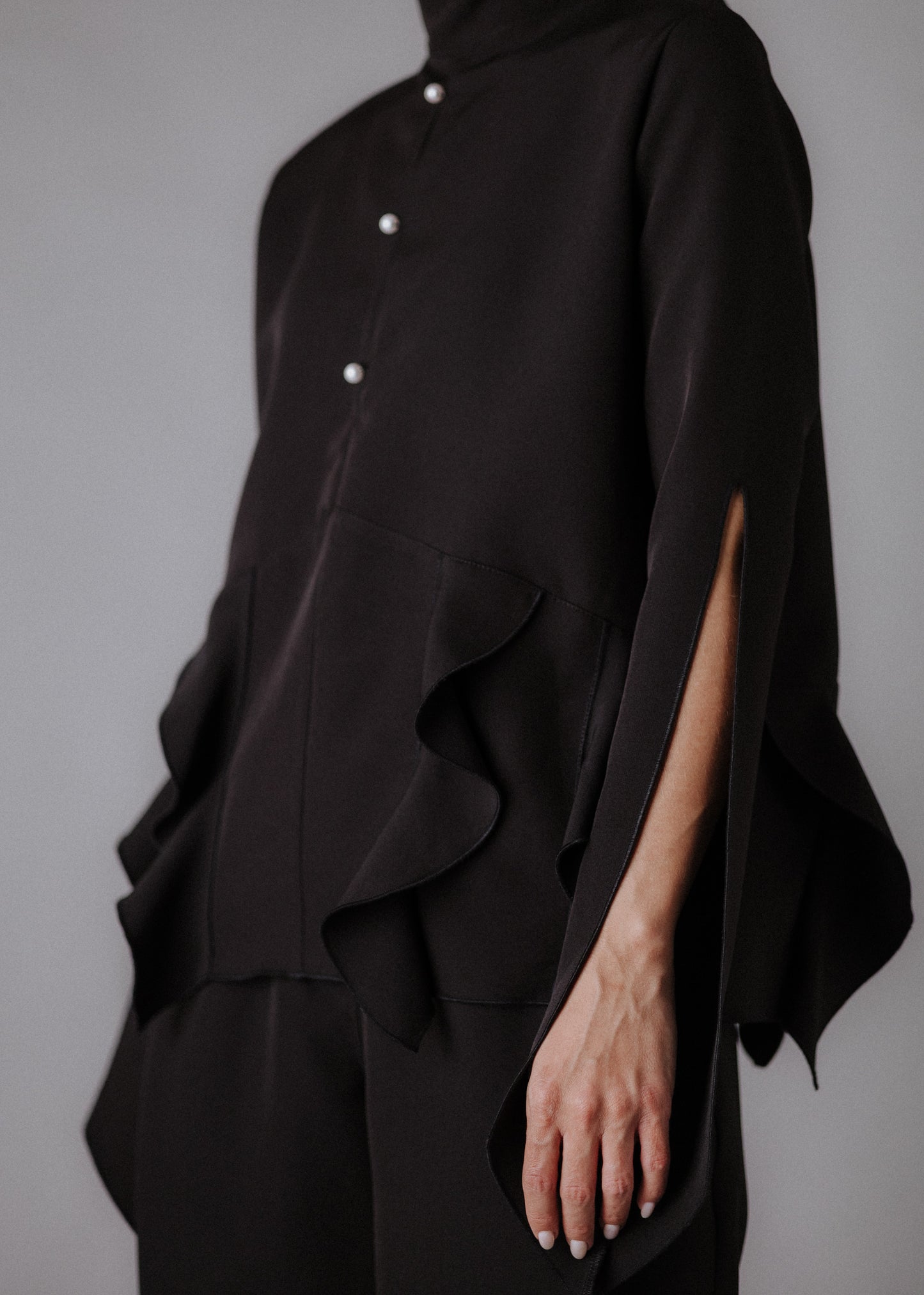 Fine fabric with top curls in black