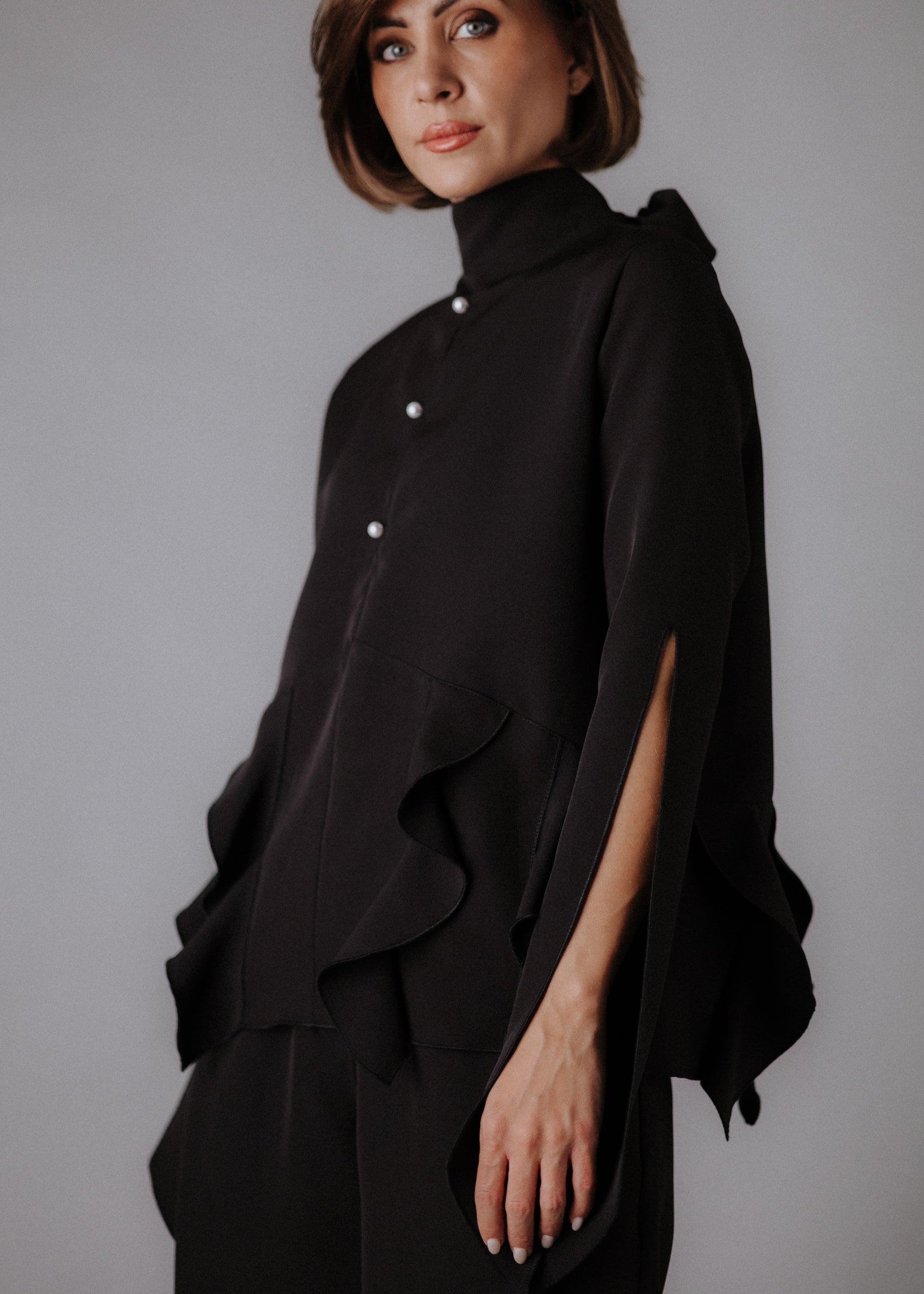 Fine fabric with top curls in black