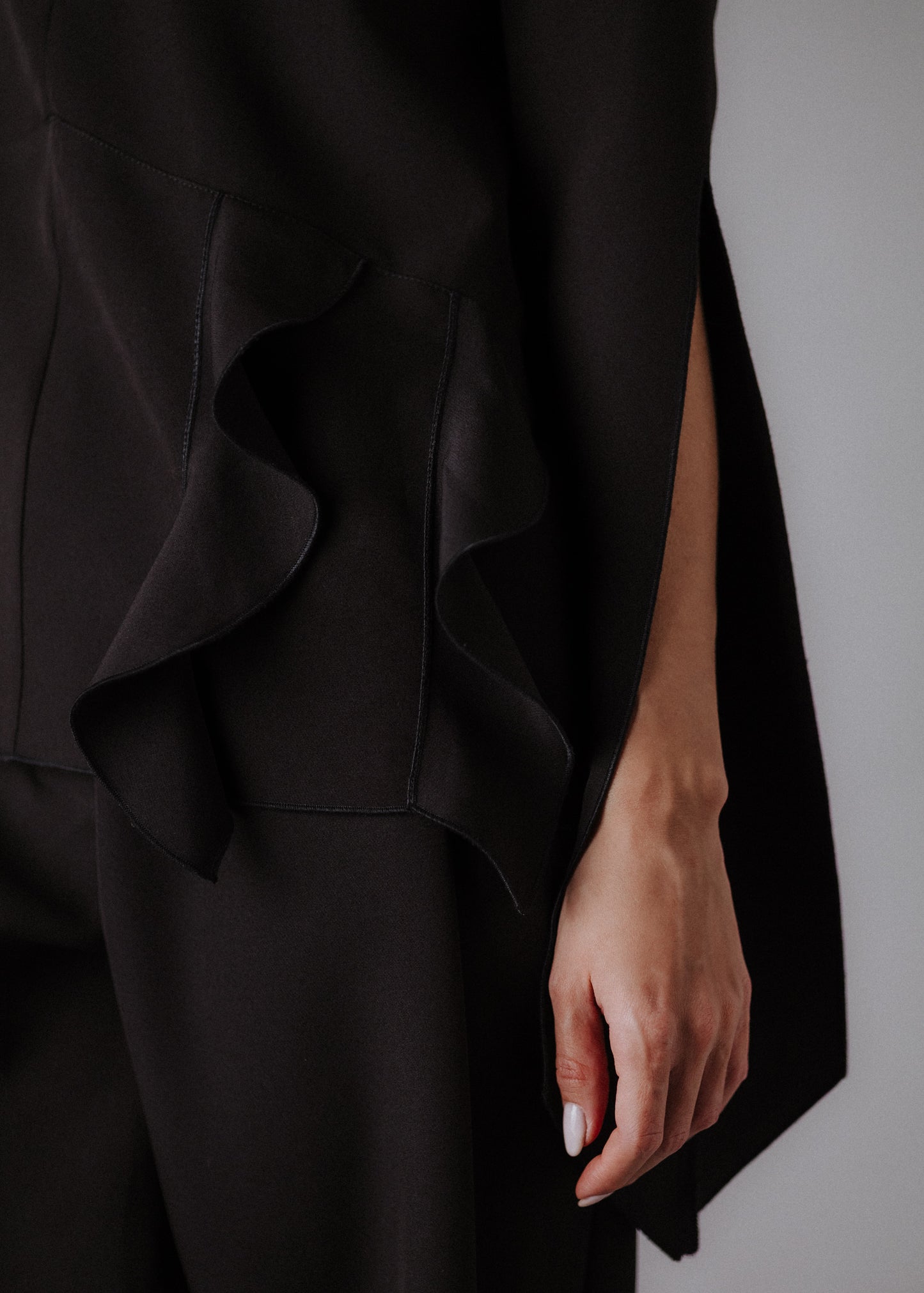 Fine fabric with top curls in black