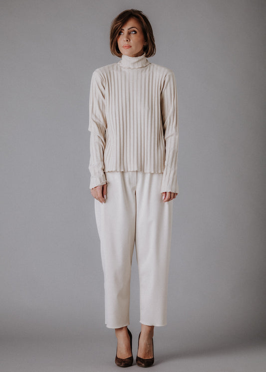 Turtleneck knitted fabric in pastel nude color