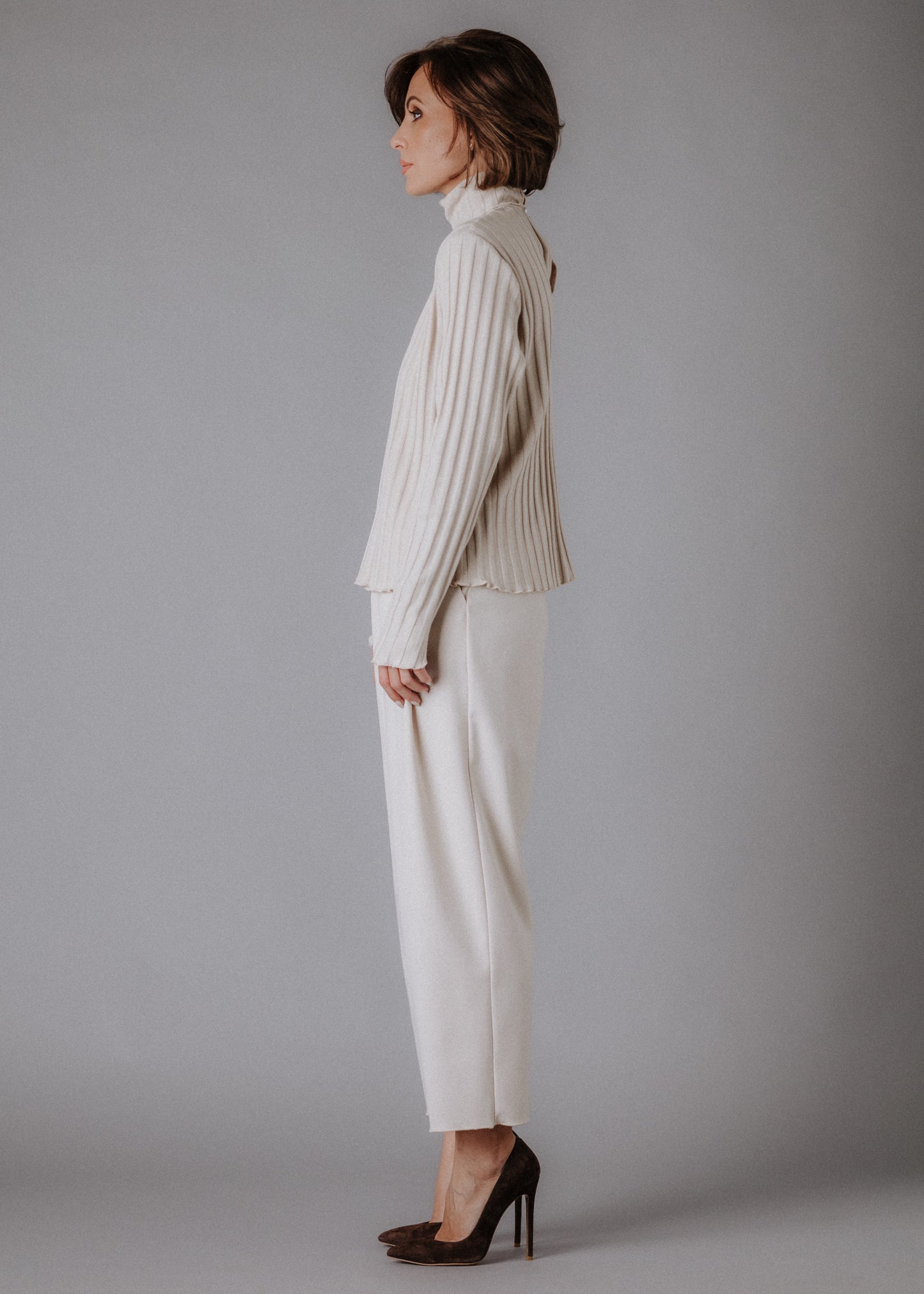 Turtleneck knitted fabric in pastel nude color