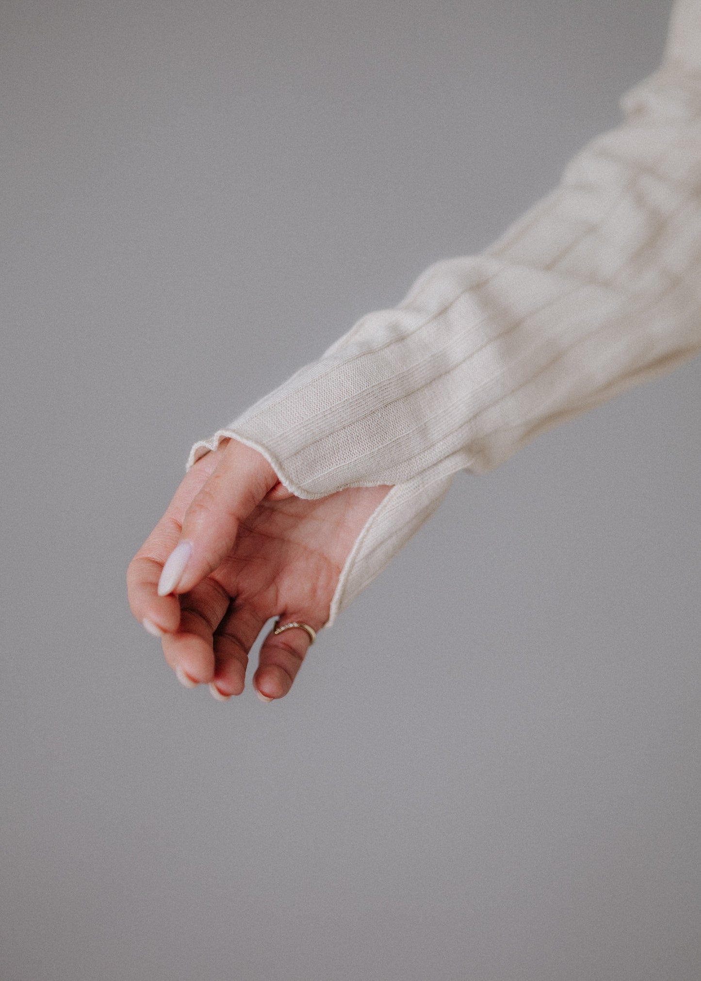 Turtleneck knitted fabric in pastel nude color