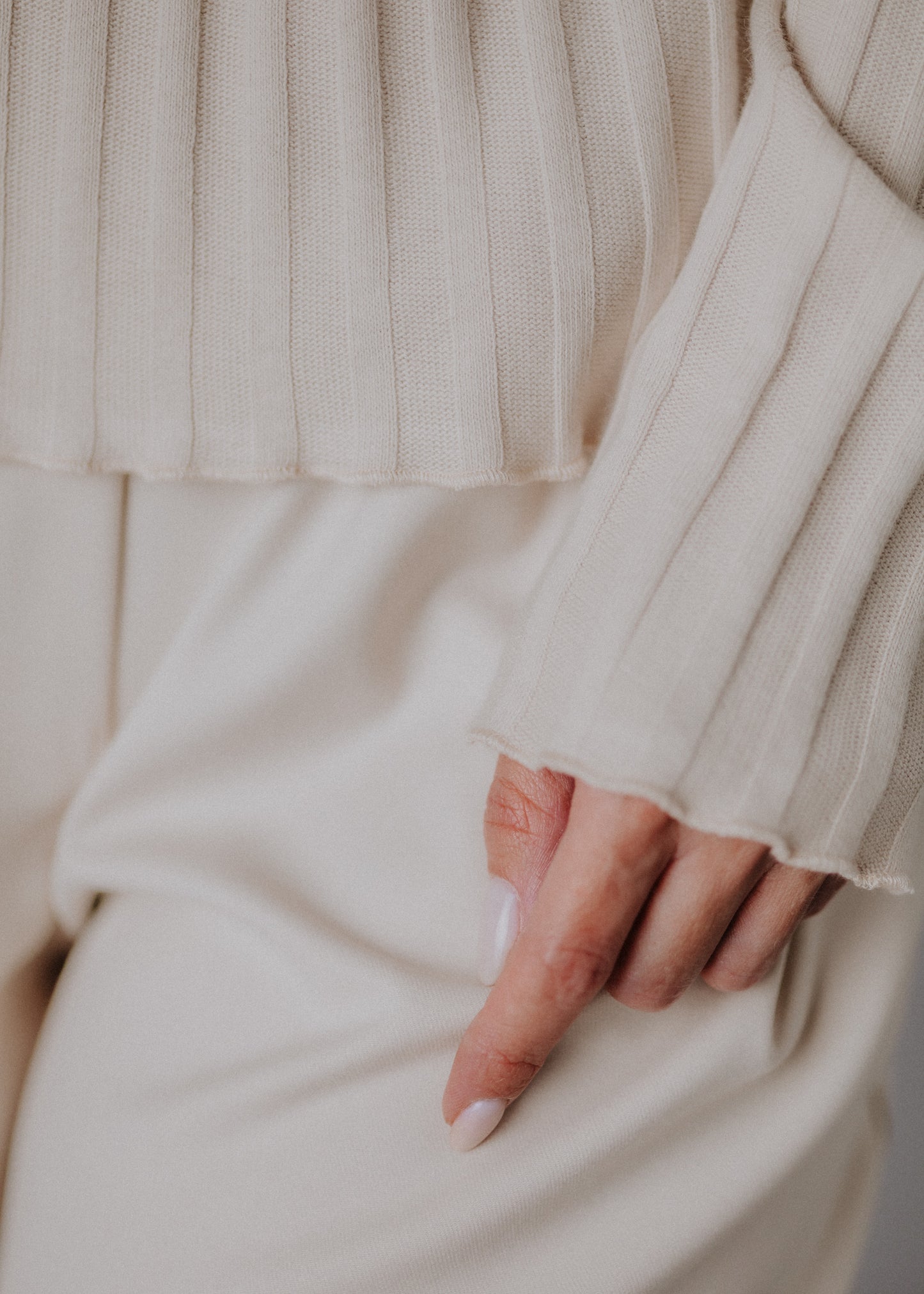 Turtleneck knitted fabric in pastel nude color