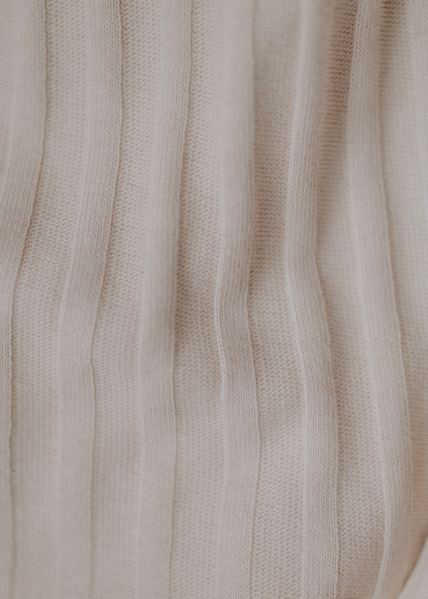 Turtleneck knitted fabric in pastel nude color