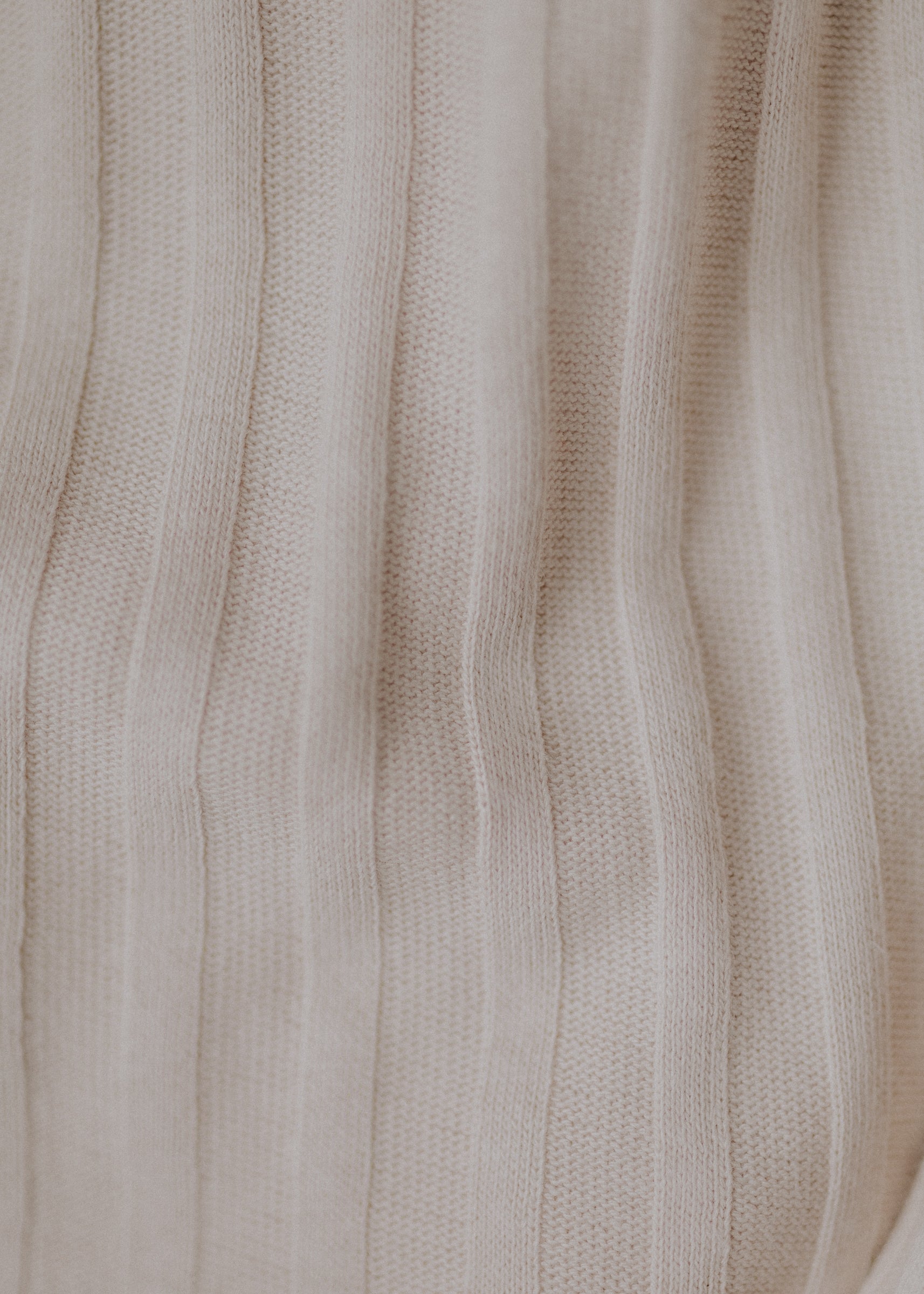 Turtleneck knitted fabric in pastel nude color