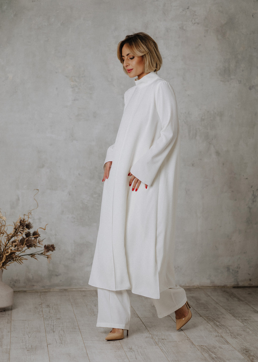 Long fabric top with edge-sewn trousers